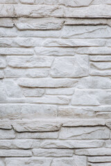 Background, texture of a wall made of gray concrete, stone bricks. Photography, abstraction, copy space.