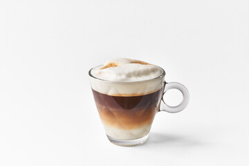  One cup of cappuccino coffee over white isolated background