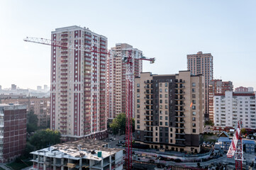 Naklejka premium Novosibirsk, Russia, August 2022: Construction of new modern houses in Novosibirsk