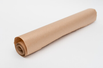 Roll of baking paper on white background