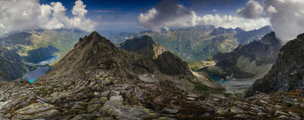 Amazing panorama landscape with high peaks, stone cliffs in mountain and view of  the Morskie Oko...