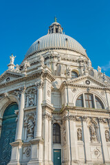 Fototapeta na wymiar Cover page over Grand Canal with Basilica di Santa Maria della Salute, in Venice historical downtown, Italy, at sunny day, blue sky