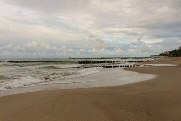 Souther Baltic sea coast, Northern Poland, Pomerania, sandy beach, dramatic sky, late winter time