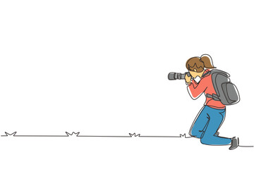 Single continuous line drawing woman photographer with backpack, standing on one knee and holding photo camera. Tourist photographing in authentic situation. One line draw design vector illustration