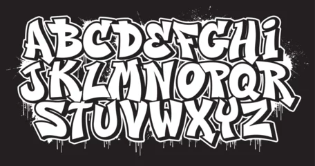 Poster Black and white decorative font in graffiti style with spray effect. Ideal for pattern, fabric print, shops and many other uses  © Harry Kasyanov