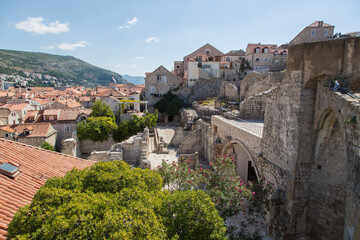 Fototapeta na wymiar View from the famous wall down to the old town and its historical remains - Dubrovnik, Croatia