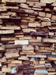 pile of wooden boards for firewood