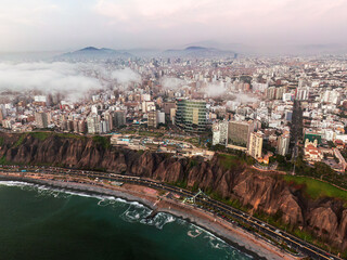 Obraz na płótnie Canvas Skyline of Miraflores/Lima/Peru with clouds seen from above
