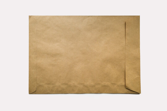 a large envelope made of kraft paper on a white background. place for text