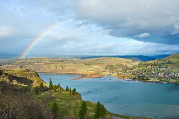 View of the the Columbia River Gorge with rainbow after rain.