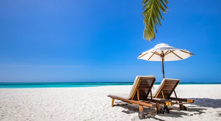 Foto op Plexiglas Beautiful panoramic nature. Tropical sunny beach as summer island landscape with chairs umbrella palm leaves calm sea shore, coast. Tranquil travel panoramic destination banner for vacation or holiday © icemanphotos