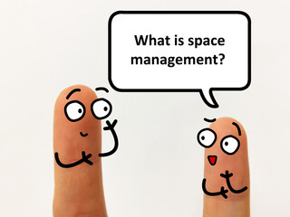 Two fingers are decorated as two person. One of them is asking another what is workplace  space management.