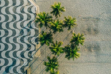 Fotobehang Top View of Copacabana beach with mosaic of sidewalk in Rio de Janeiro. Brazil © Alexandre Rotenberg