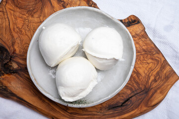 White ball of Italian soft cheese Mozzarella di Bufala Campana