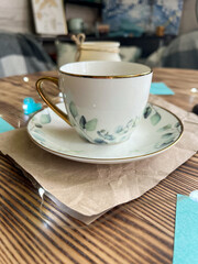 Cup of coffee on wooden table 