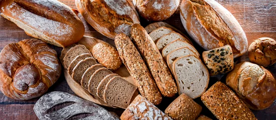 Photo sur Aluminium Boulangerie Assorted bakery products including loafs of bread and rolls