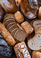 Assorted bakery products including loafs of bread and rolls