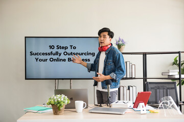 Young Asian live coach teach online business at home