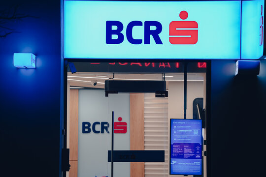 The logo sign of BCR (Banca Comerciala Romana in Romanian language) banking company on top of a bank agency from Bucharest, Romania, 2023.