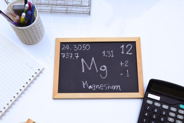 magnesium and symbol structural formula chemical on the blackboard