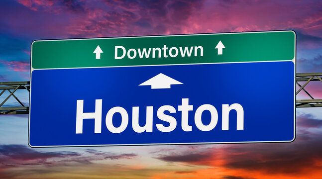 Road sign indicating direction to the city of Houston