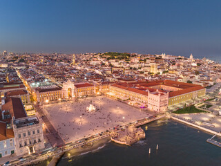 Obraz premium Commerce Square at night in Lisbon, Portugal. Palace Yard, Royal Palace of Ribeira. Drone Point of View