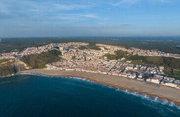 Fototapeta na wymiar Nazare Town in Portugal. Beach and Cityscape. Drone Point of view.