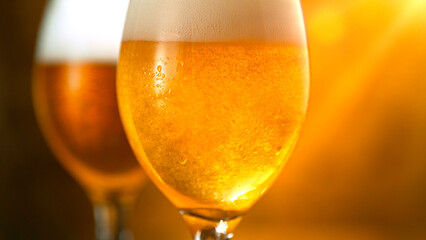 Freshly brewed beer in a pint on vintage backgorund, close-up