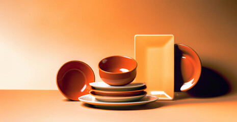 illustrazione creata con intelligenza artificiale di ceramiche sui toni dell' arancione, piatti, tazze, fondine , luci di studio, ordine gradevole