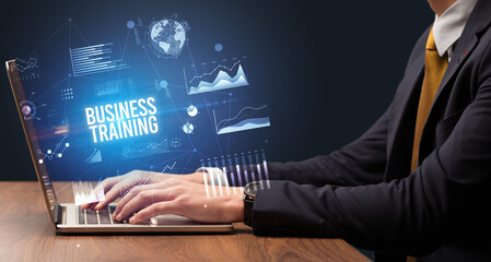 Businessman working on laptop, business concept