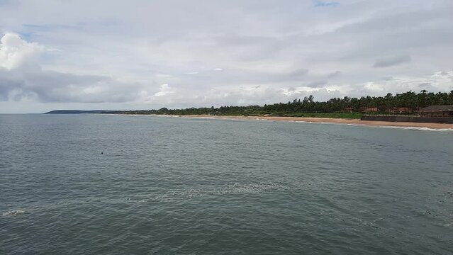 Candolim Beach in goa. monsoon clouds in Goa beach. sinquerim beach.	
