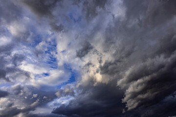 Naklejka na ściany i meble Dramatic sky of storm clouds