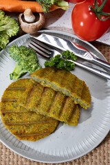 Grilled tasty vegan and vegetarian burgers made from fresh broccoli vegetables and dried legumes and beans