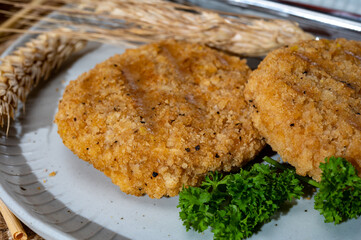 Source of fibre plant based vegan wheat protein grilled burgers, meat free healthy food close up