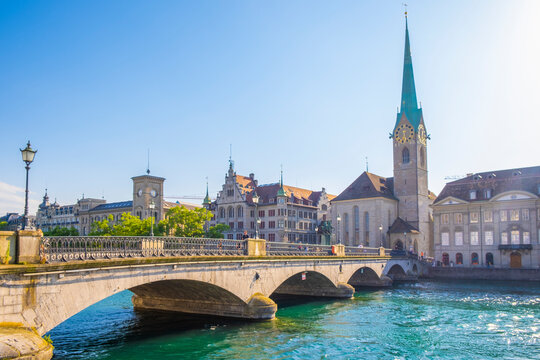 Scenic panoramic view of historic Z&uuml;rich city center with famous Fraum&uuml;nster and Grossm&uuml;nster Church and river Limmat at Lake Zurich on a beautiful sunny day with blue sky in summer, Switzerland