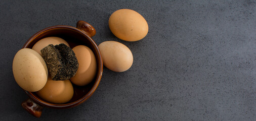 Truffled eggs with a tuber melanosporum winter truffle