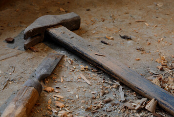 old rusty carpenter s tools hammer and chisel on the workbench