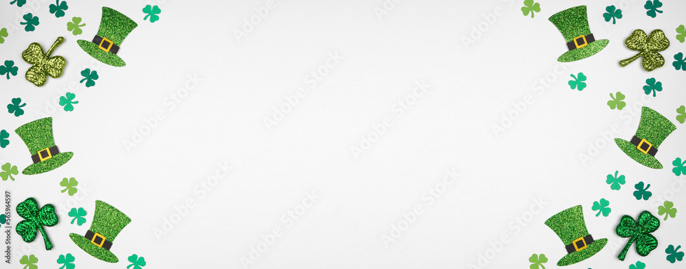 Poster st patricks day shamrock and green leprechaun hat double border. above view over a white banner back
