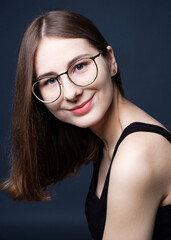 Fototapeta premium portrait of young confident happy woman in studio