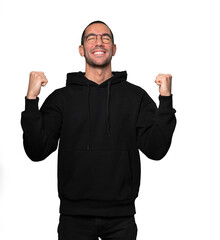 Fototapeta premium Competitive young man making a gesture of celebration