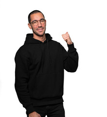 Fototapeta premium Amazed young man making a gesture of welcome