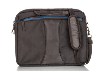 One black laptop carrying bag made of waterproof material macro isolated on white background.