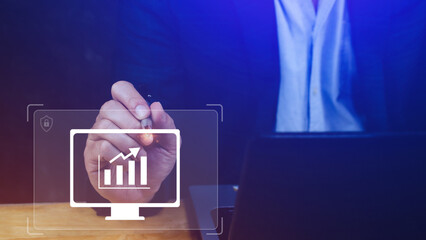 Businessman showing business growth on graph Hands touching graphs representing increasing profits...