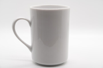White ceramic cup isolated on a white background