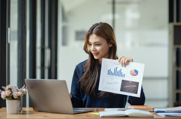 Technology and financial advisory services concert. Business teamwork and working on digital laptop computer with advisor showing plan of investment to clients at table office. Digital marketing.
