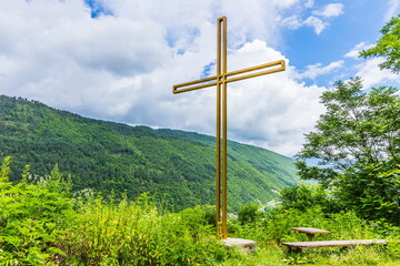 Fototapeta na wymiar Cross of a small ancient Georgian church, Georgia