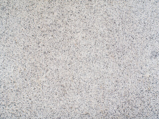 Gray textured Granite wall background.