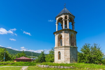 Fototapeta na wymiar bell tower of a small ancient Georgian church, Georgia