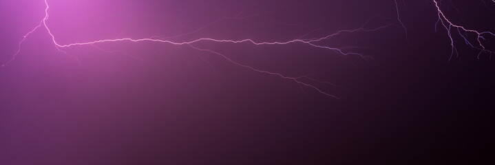 vertical lightning Flashes Across a Stormy Night Sky