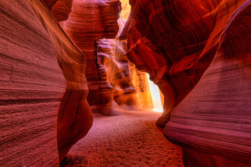 Hidden secrets in famous antelope - sunray shines through the canyon